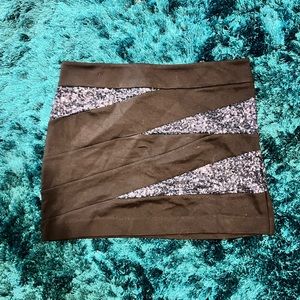 Black mini skirt with fierce sequins on the side.
